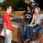 Students sitting at Moulton Tower talking